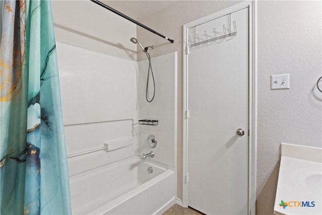 bathroom with shower / bathtub combination with curtain