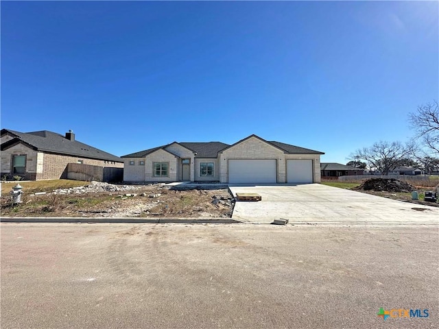 view of front of home with a garage