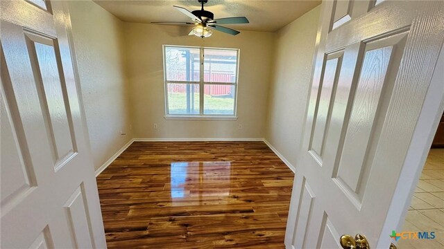 full bath featuring a healthy amount of sunlight, vanity, toilet, and wood finished floors