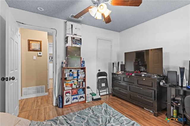 1003 Tyler Dr, Copperas Cove, TX 76522 - bedroom featuring wood finished floors and a ceiling fan