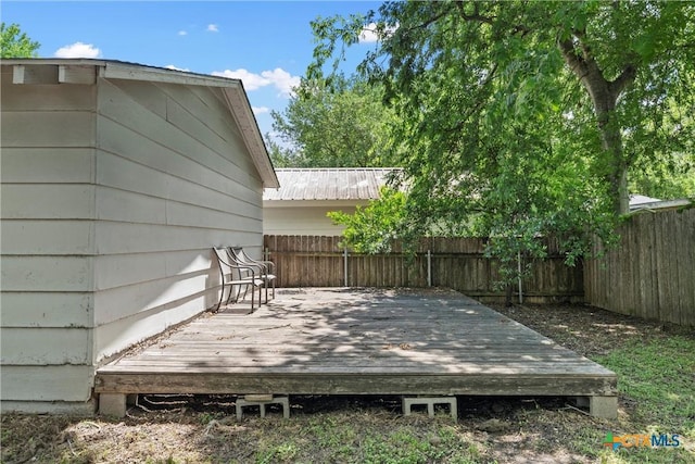 deck featuring a fenced backyard