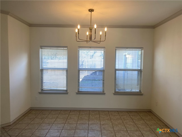 empty room with crown molding, tile patterned flooring, and an inviting chandelier