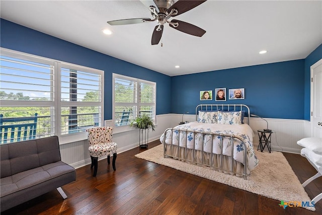 bedroom with recessed lighting, wainscoting, ceiling fan, and hardwood / wood-style floors