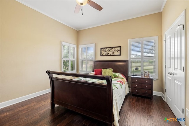 bedroom featuring baseboards, ornamental molding, a ceiling fan, and dark wood-style floors
