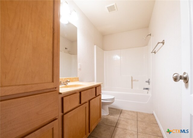 full bathroom featuring toilet, tub / shower combination, vanity, and tile patterned flooring