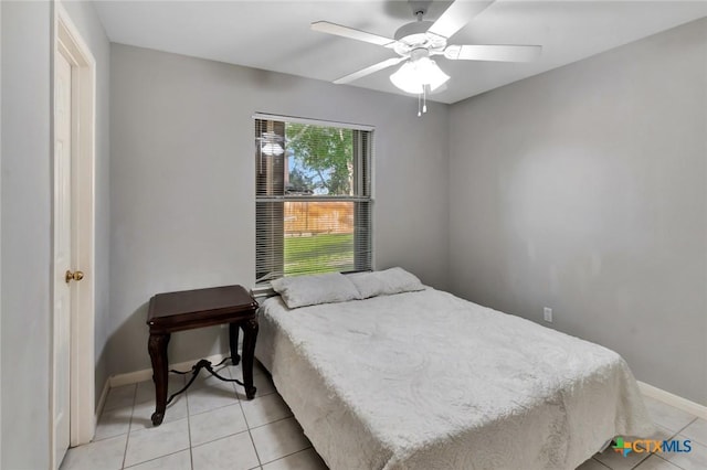 722 Ashland Crk, Victoria, TX 77901 - bedroom with light tile patterned floors and ceiling fan