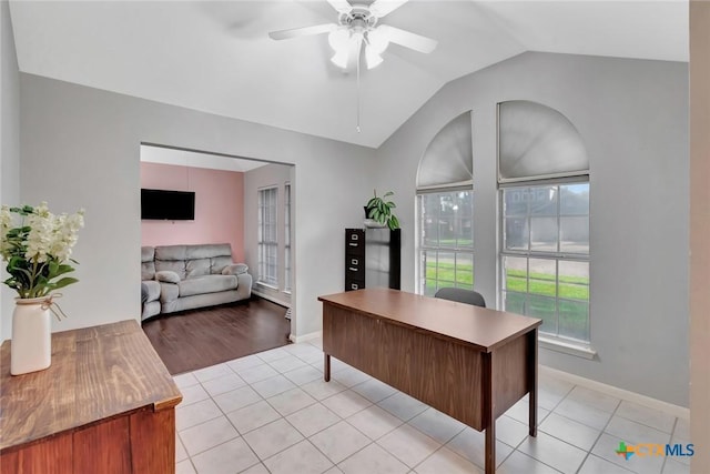 722 Ashland Crk, Victoria, TX 77901 - office area with vaulted ceiling, healthy amount of natural light, light tile patterned floors, and a ceiling fan