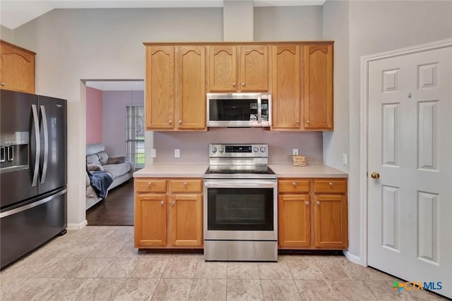 722 Ashland Crk, Victoria, TX 77901 - kitchen featuring stainless steel appliances and light countertops
