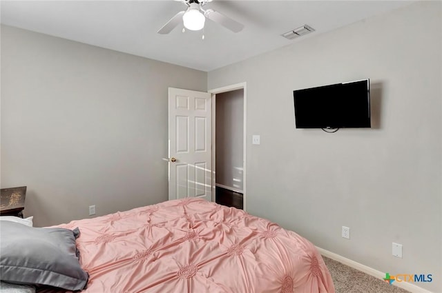 722 Ashland Crk, Victoria, TX 77901 - carpeted bedroom featuring baseboards and a ceiling fan