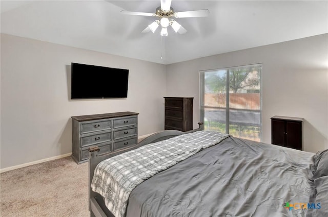 722 Ashland Crk, Victoria, TX 77901 - bedroom featuring light carpet and ceiling fan