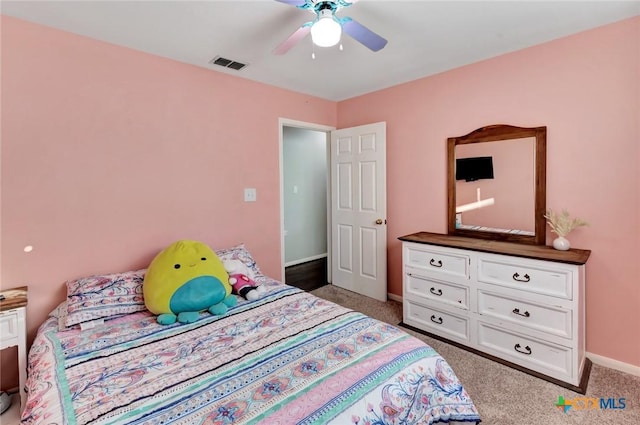 722 Ashland Crk, Victoria, TX 77901 - carpeted bedroom with baseboards and ceiling fan