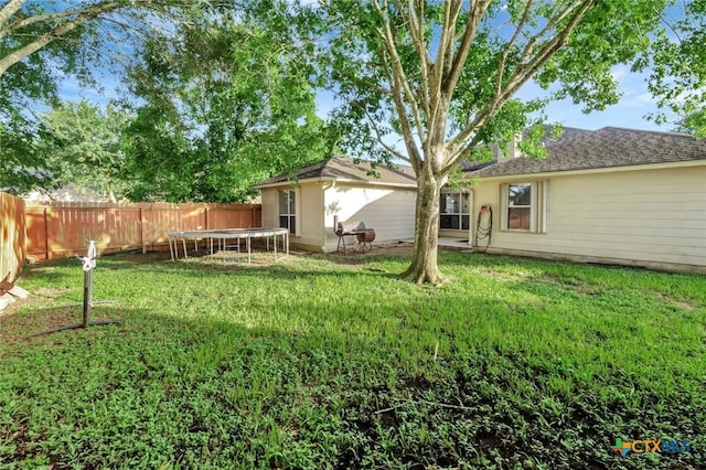 722 Ashland Crk, Victoria, TX 77901 - view of yard featuring a trampoline