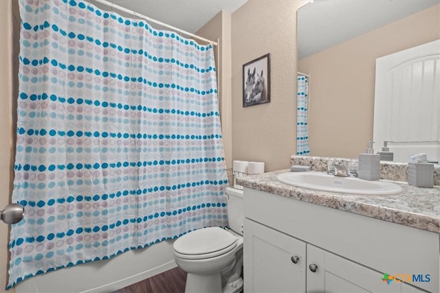 full bathroom featuring shower / bath combination with curtain, vanity, toilet, and wood-type flooring