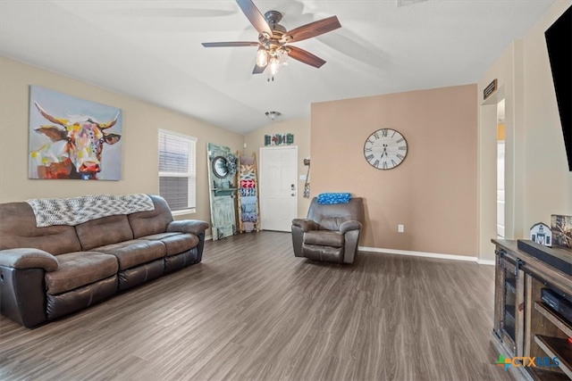 living room with vaulted ceiling, ceiling fan, and hardwood / wood-style floors