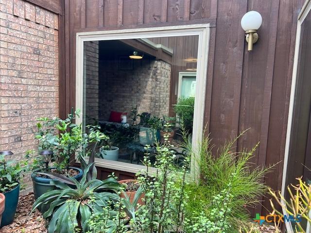 6014 Country Club Dr, Victoria, TX 77904 - doorway to property with brick siding