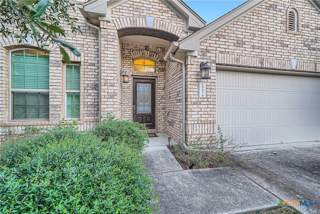 property entrance with a garage