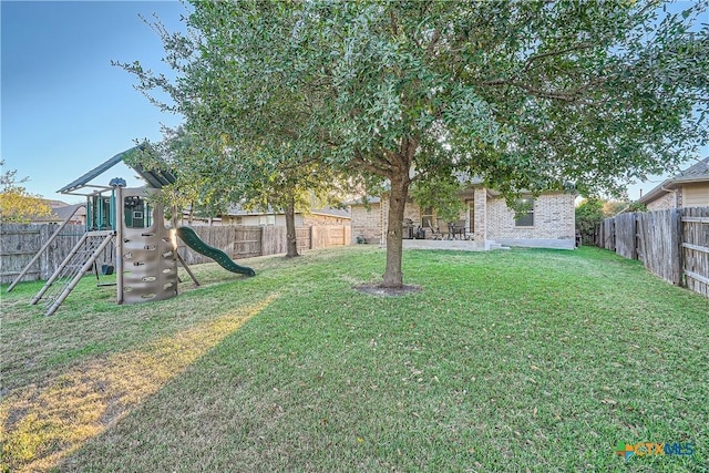 view of yard featuring a playground