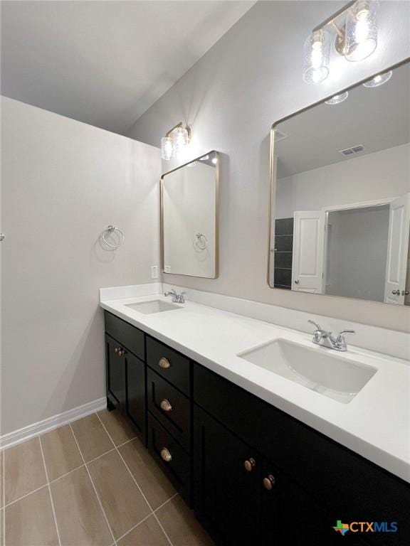 bathroom featuring vanity and tile patterned floors