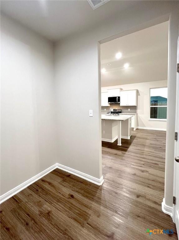 interior space with hardwood / wood-style floors