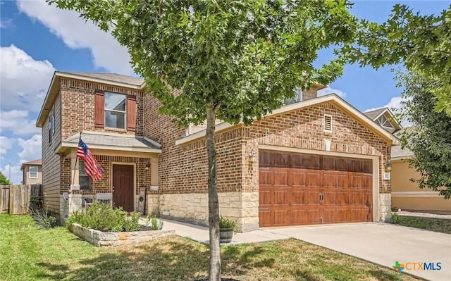 view of front facade featuring concrete driveway, brick siding, an attached garage, and fence