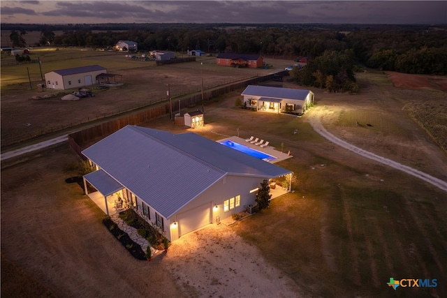 view of aerial view at dusk