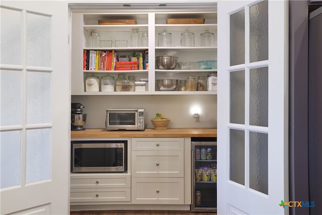 pantry featuring beverage cooler