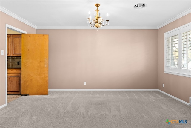 unfurnished room with ornamental molding, light carpet, and a chandelier