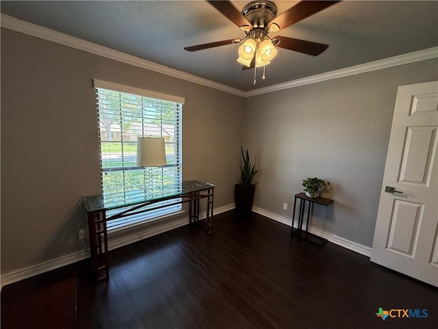 4310 Ponderosa Ln, Temple, TX 76502 - spare room featuring dark wood-type flooring, ceiling fan, baseboards, and ornamental molding