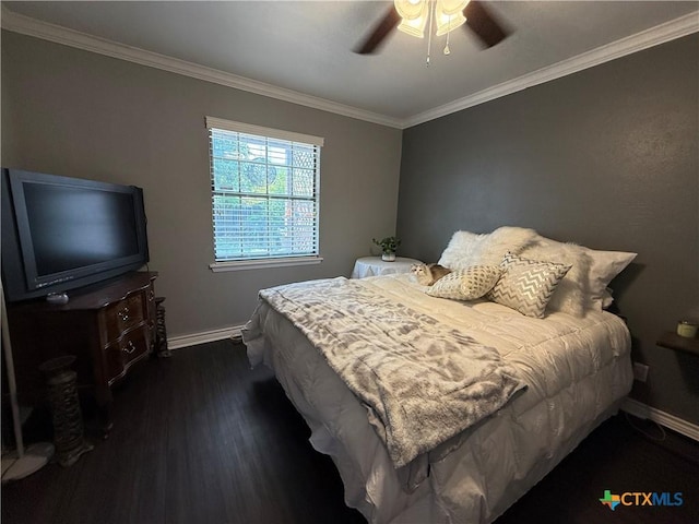 4310 Ponderosa Ln, Temple, TX 76502 - bedroom featuring baseboards, dark wood-type flooring, crown molding, and ceiling fan