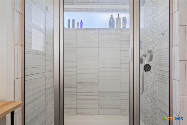 bathroom with an enclosed shower