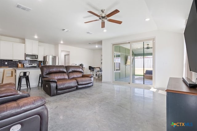 living room featuring ceiling fan