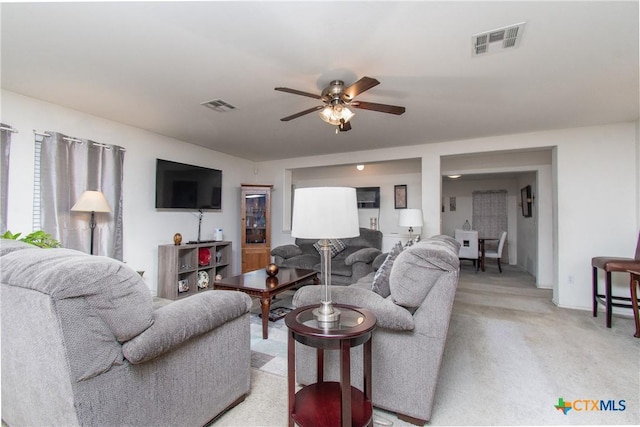 living room with ceiling fan