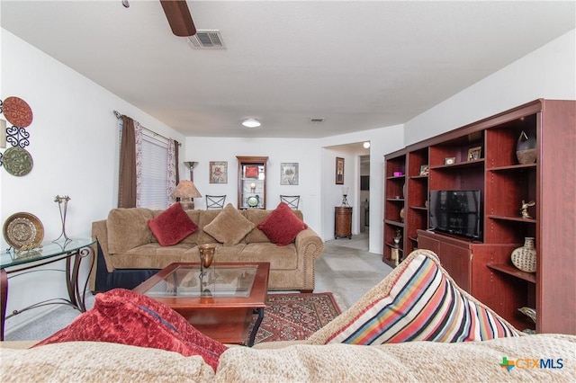 living room with light colored carpet