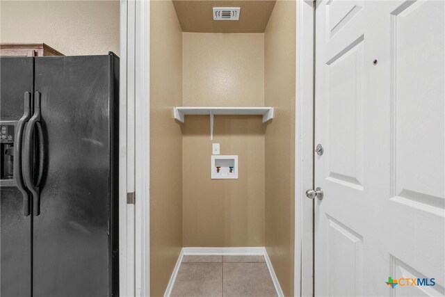 308 Constellation Dr, Killeen, TX 76542 - laundry area with tile patterned floors, baseboards, and hookup for a washing machine