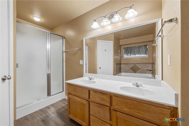 308 Constellation Dr, Killeen, TX 76542 - full bath with a stall shower, double vanity, wood finished floors, and a bath