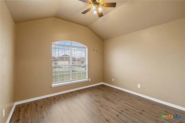 308 Constellation Dr, Killeen, TX 76542 - spare room featuring a ceiling fan, wood finished floors, lofted ceiling, and baseboards