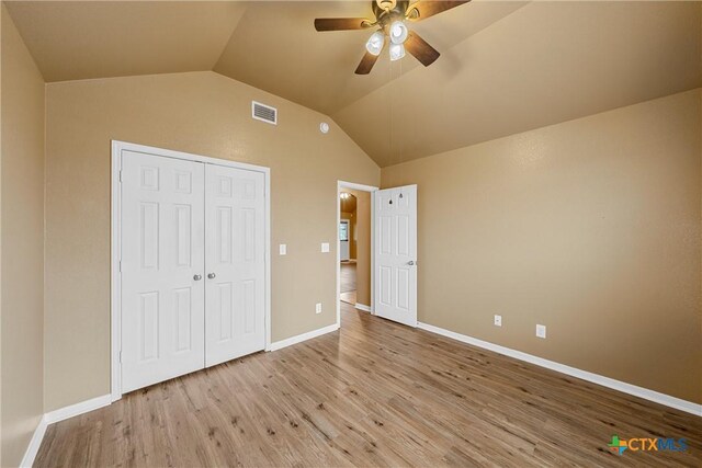 308 Constellation Dr, Killeen, TX 76542 - unfurnished bedroom featuring wood finished floors, lofted ceiling, a closet, baseboards, and ceiling fan