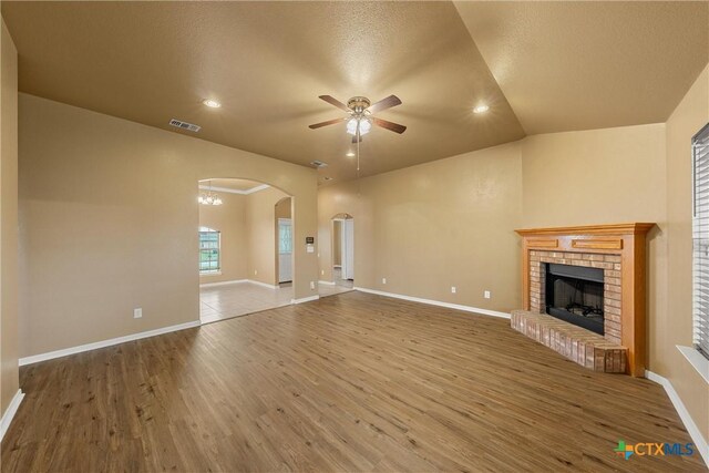 308 Constellation Dr, Killeen, TX 76542 - unfurnished living room with ceiling fan, wood finished floors, a fireplace, baseboards, and recessed lighting