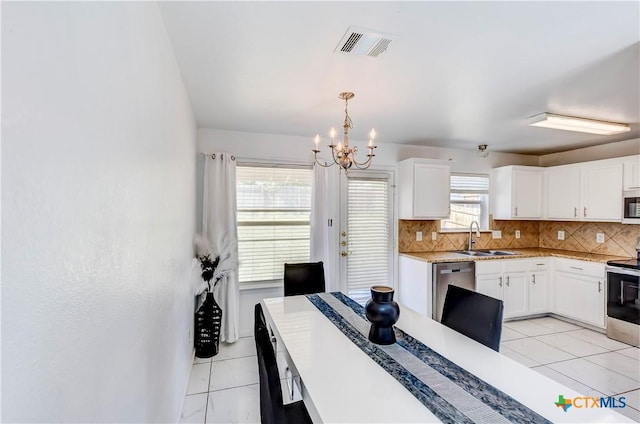 5500 Lions Gate Ln, Killeen, TX 76549 - dining room with a chandelier