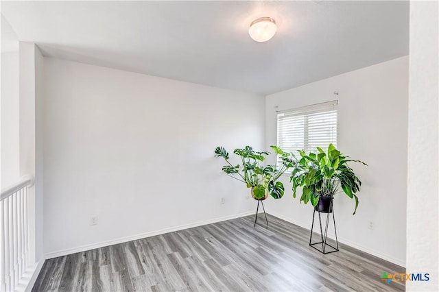 5500 Lions Gate Ln, Killeen, TX 76549 - empty room with wood finished floors and baseboards