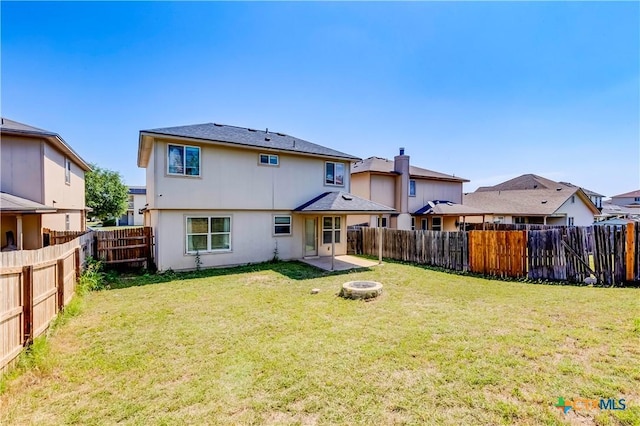 5500 Lions Gate Ln, Killeen, TX 76549 - back of property with a fenced backyard, a fire pit, and a residential view