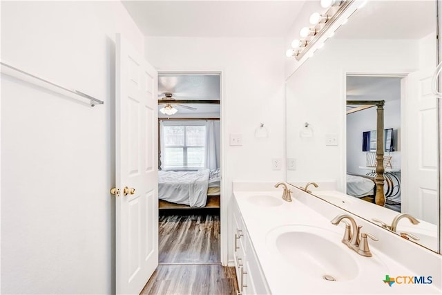 5500 Lions Gate Ln, Killeen, TX 76549 - ensuite bathroom with double vanity, wood finished floors, and a ceiling fan