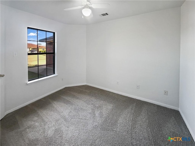 carpeted empty room with ceiling fan