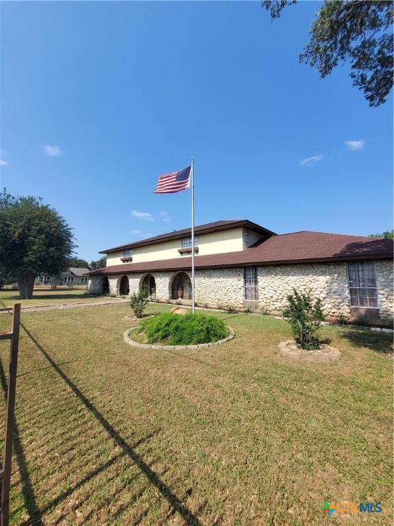313 N Church, Goliad, TX 77963 - back of property featuring stone siding