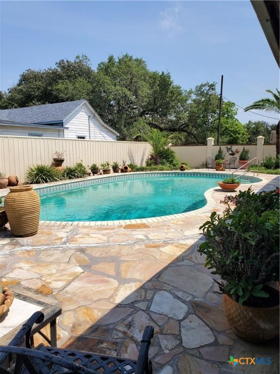 313 N Church, Goliad, TX 77963 - view of pool with a fenced backyard and a patio area