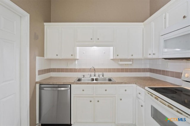 4103 Barrington Trl, Killeen, TX 76549 - kitchen featuring white appliances, white cabinetry, and tasteful backsplash