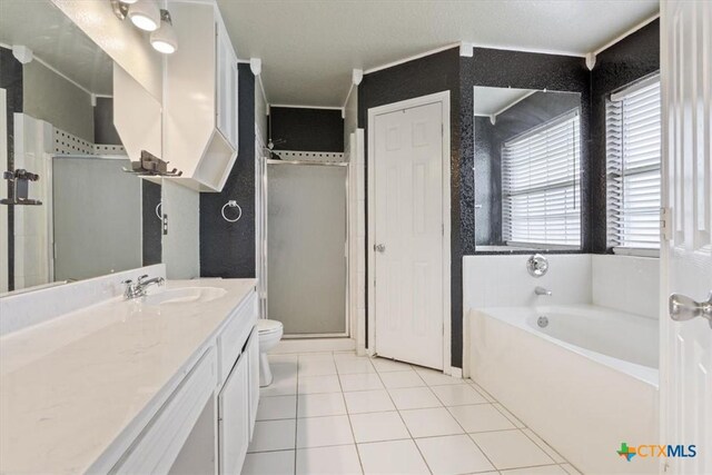 4103 Barrington Trl, Killeen, TX 76549 - full bath with vanity, a shower stall, a garden tub, tile patterned floors, and crown molding