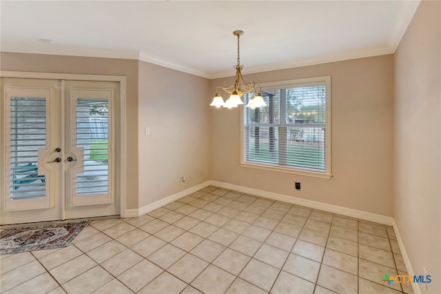 unfurnished dining area with french doors, light tile patterned floors, crown molding, and a notable chandelier