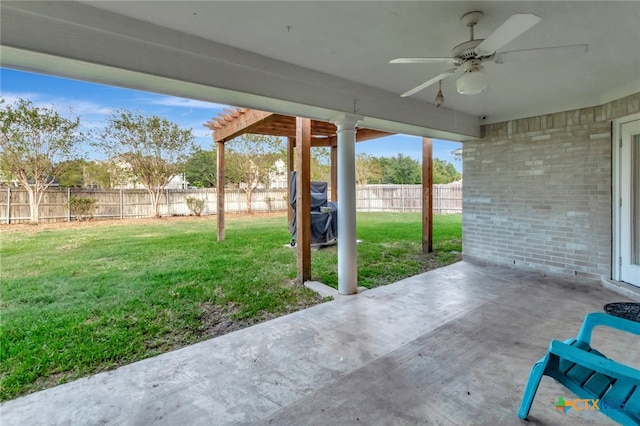 view of patio featuring ceiling fan