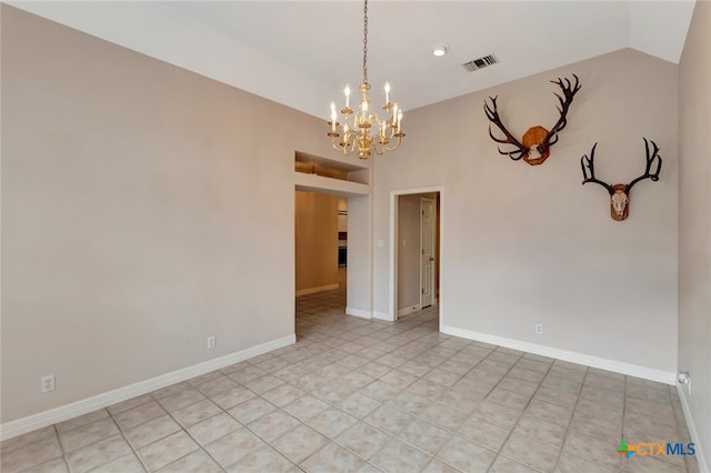 unfurnished room featuring light tile patterned floors, an inviting chandelier, and lofted ceiling